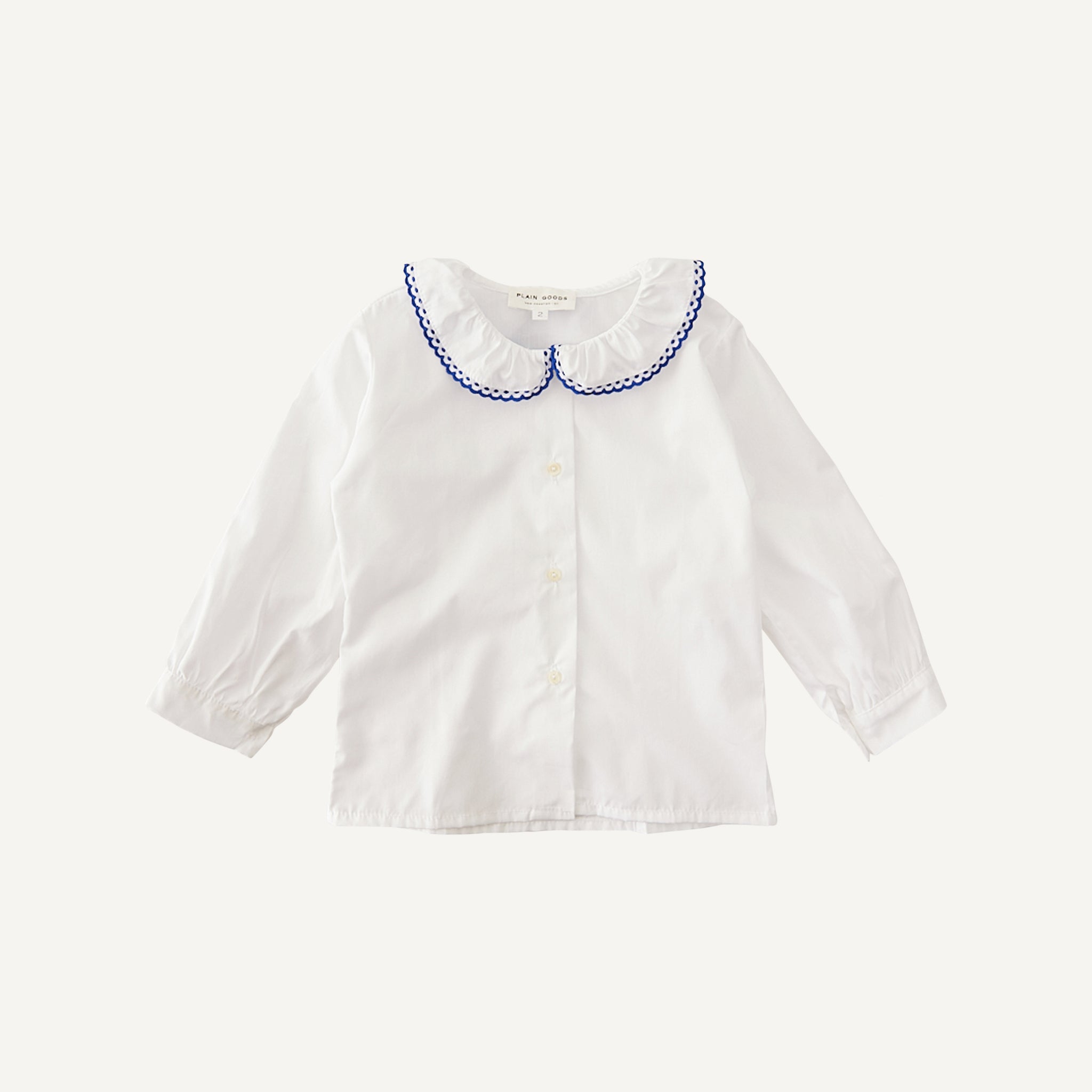 PLAIN GOODS EMBROIDERED RUFFLE BLOUSE