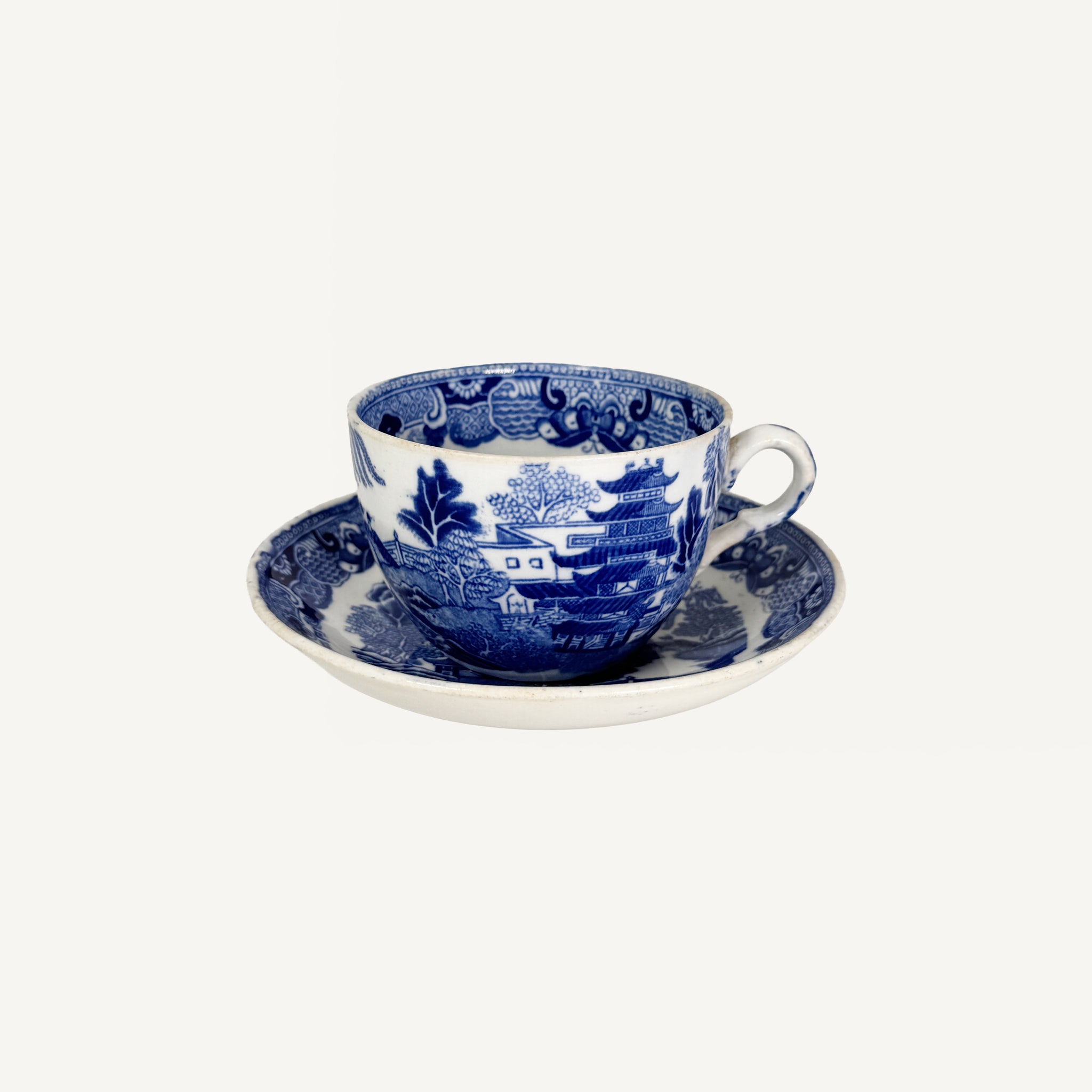 ANTIQUE CUP & SAUCER