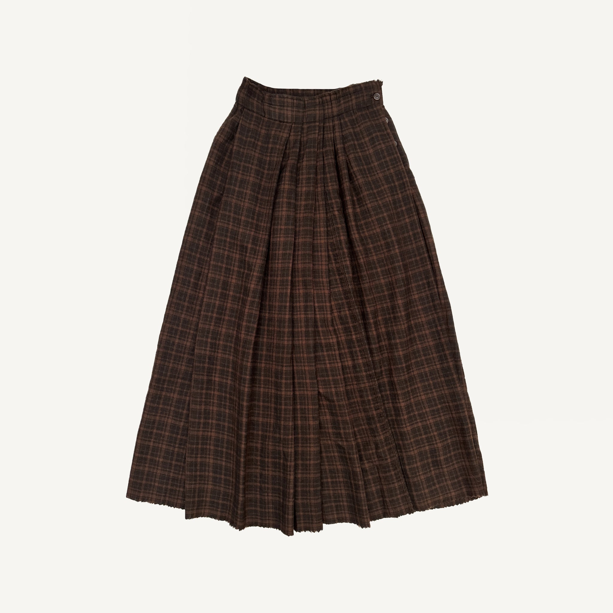 MAKU ASYMMETRICAL PLEATED SKIRT