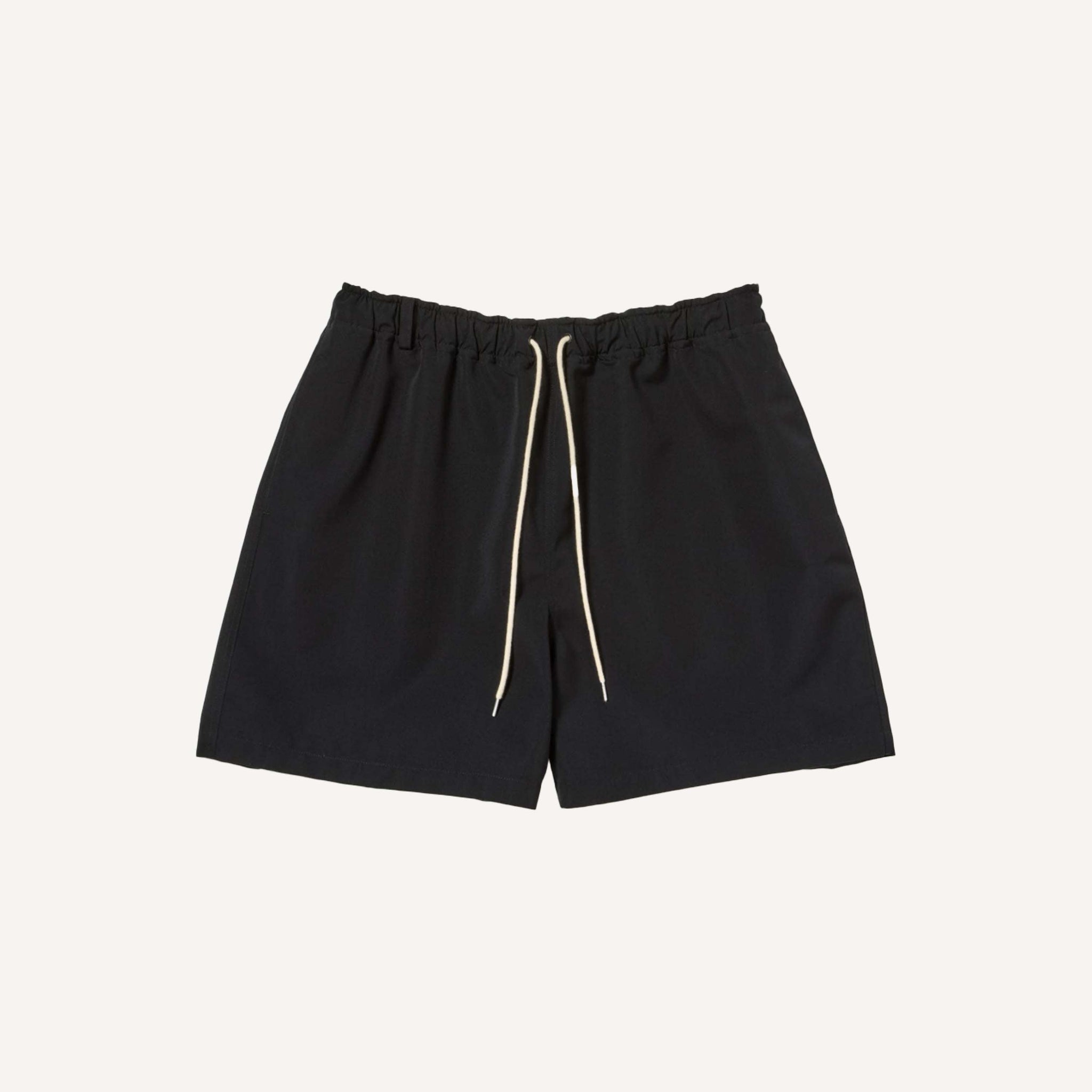 AURALEE WOOL MAX CANVAS SHORTS