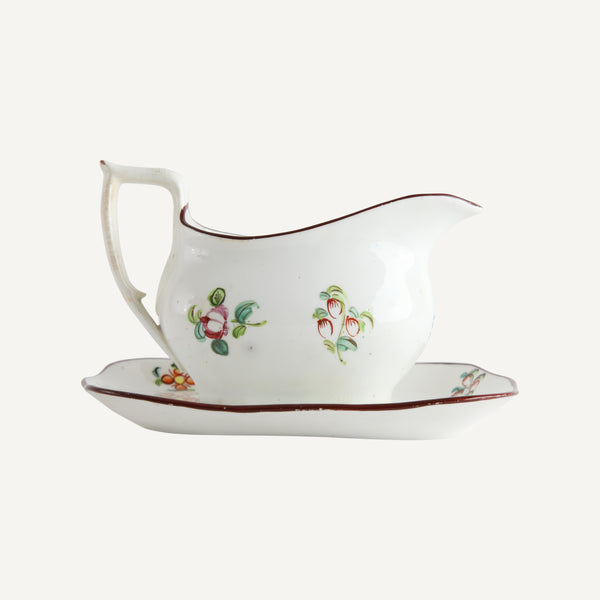 ANTIQUE CREAMER AND PLATE