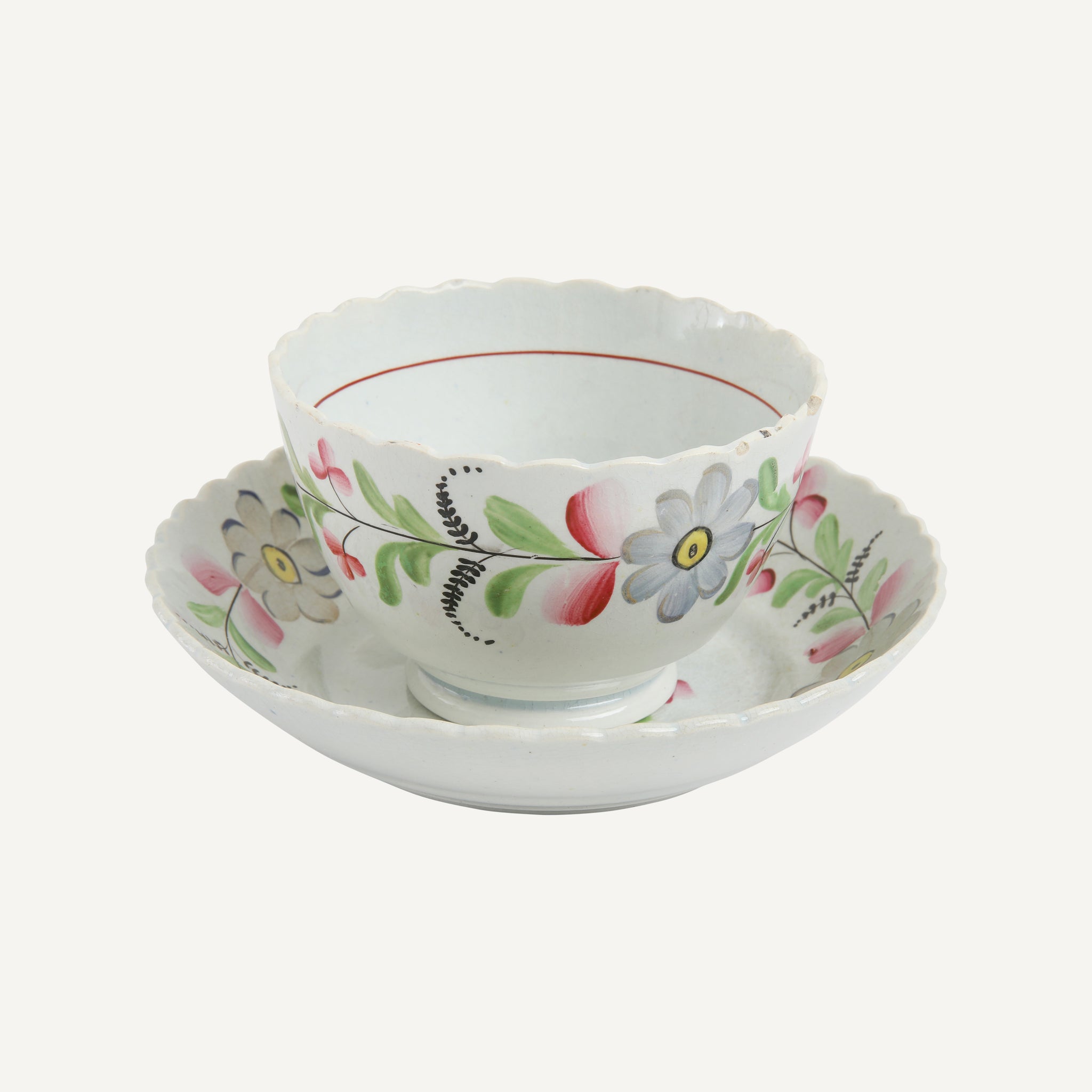 ANTIQUE TEA CUP AND SAUCER