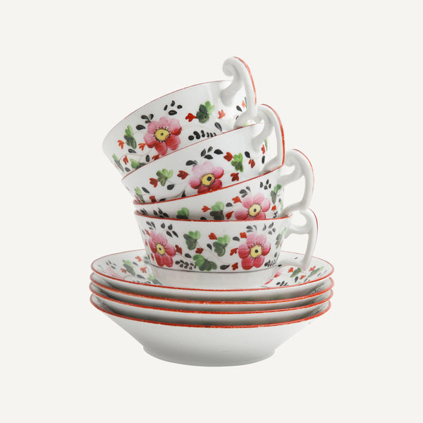 ANTIQUE SOFT PASTE PORCELAIN CUPS AND SAUCERS
